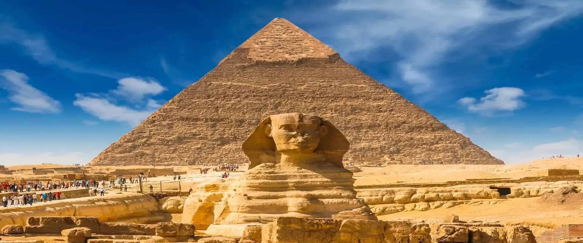 Travelers at the Great Sphinx with the Pyramid of Khafre behind