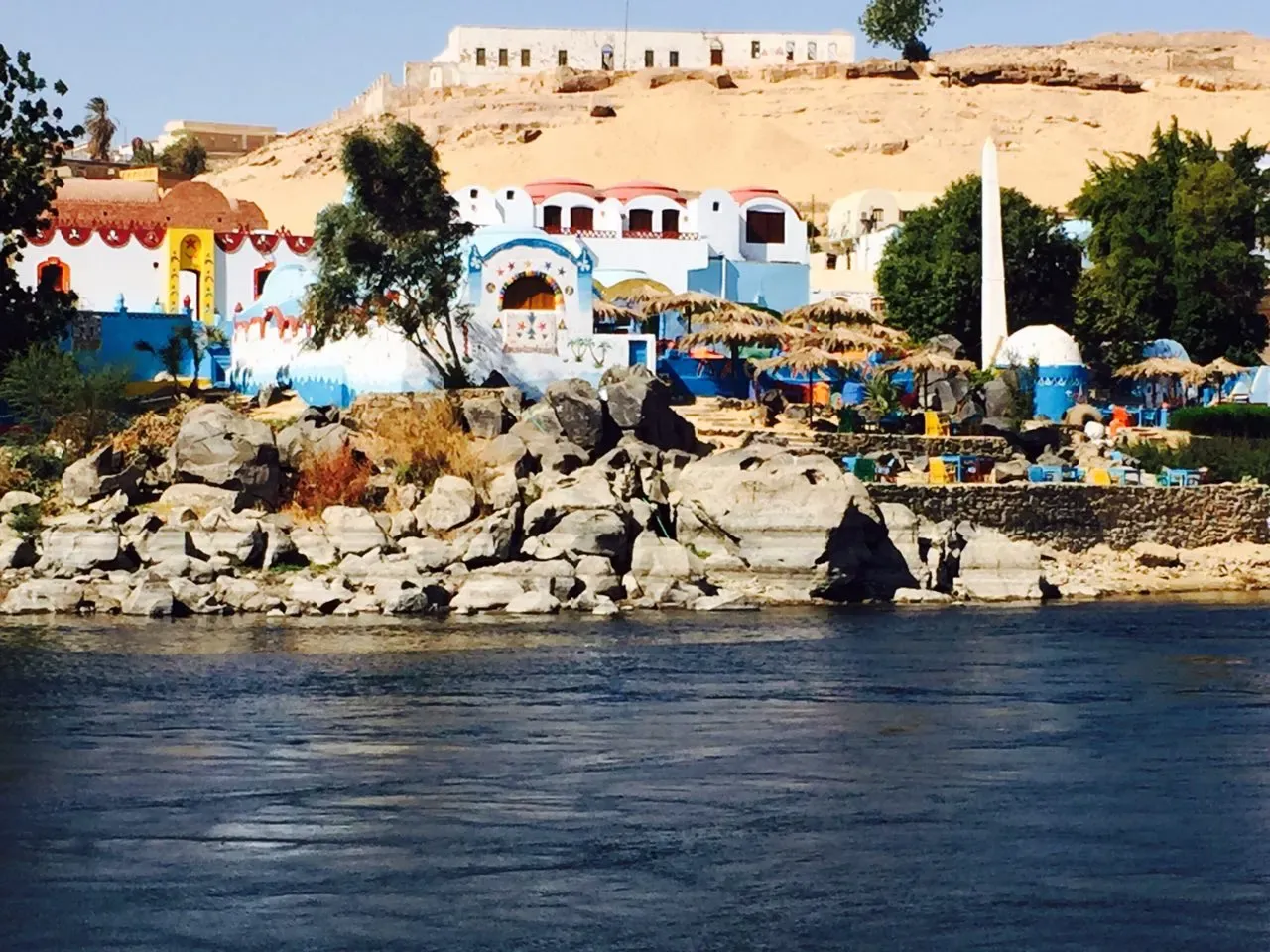 A colorful Nubian village market in Aswan, the perfect place to explore what to buy in egypt including spices and perfumes