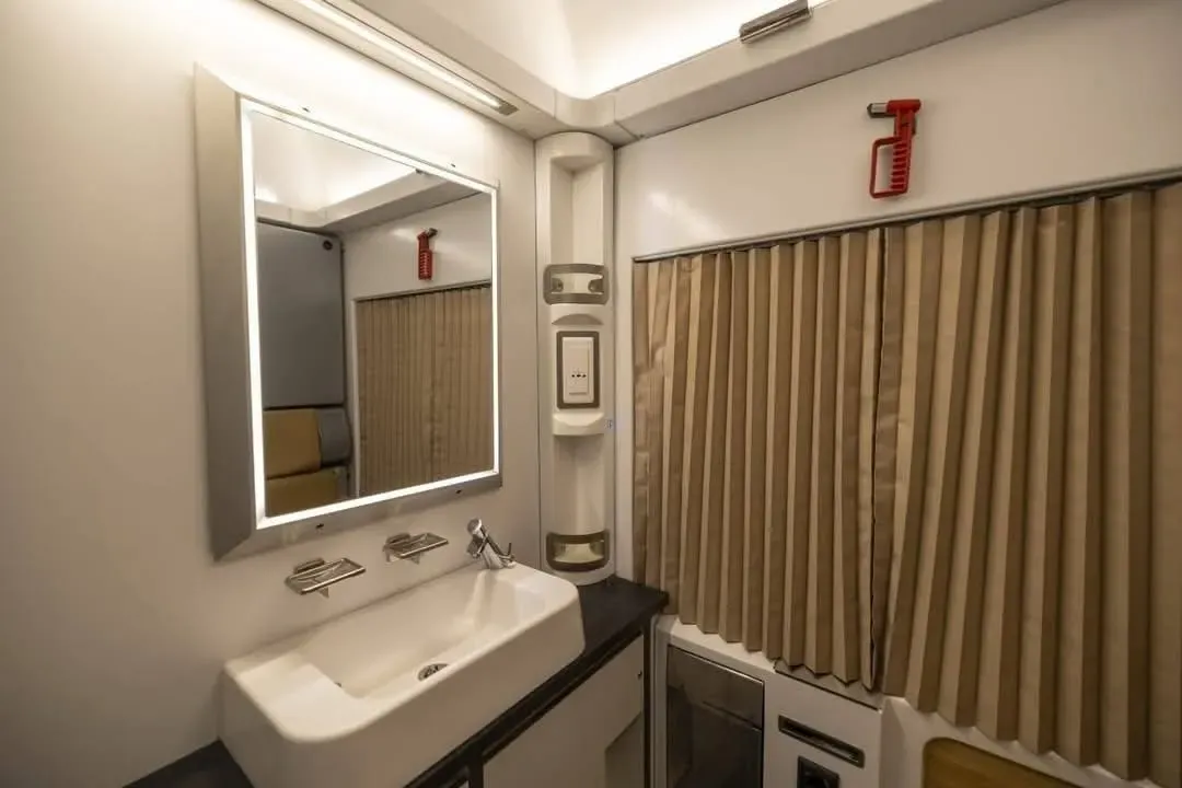 Newly renovated Egypt sleeper train cabin with bunk beds and fresh linens