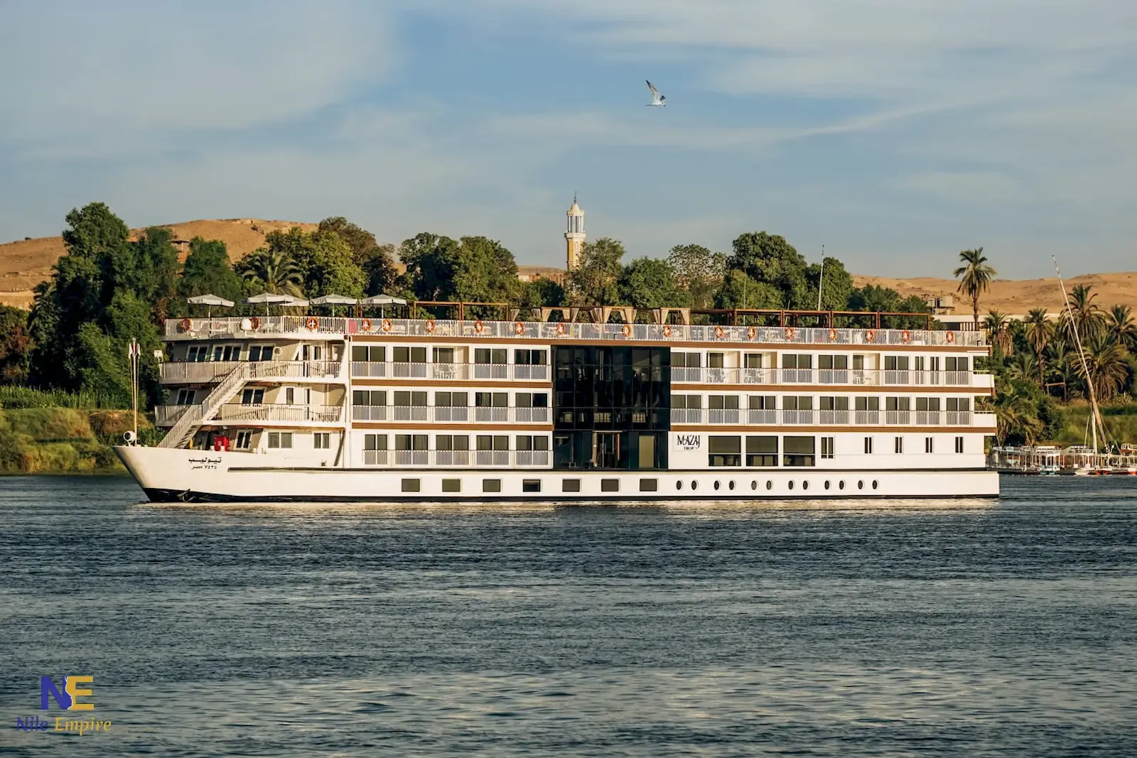 Tulip Nile Cruise on the Nile with palm trees